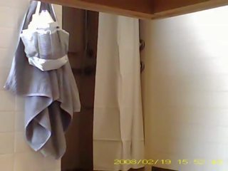 Spying inviting 19 year old girl showering in dorm bathroom